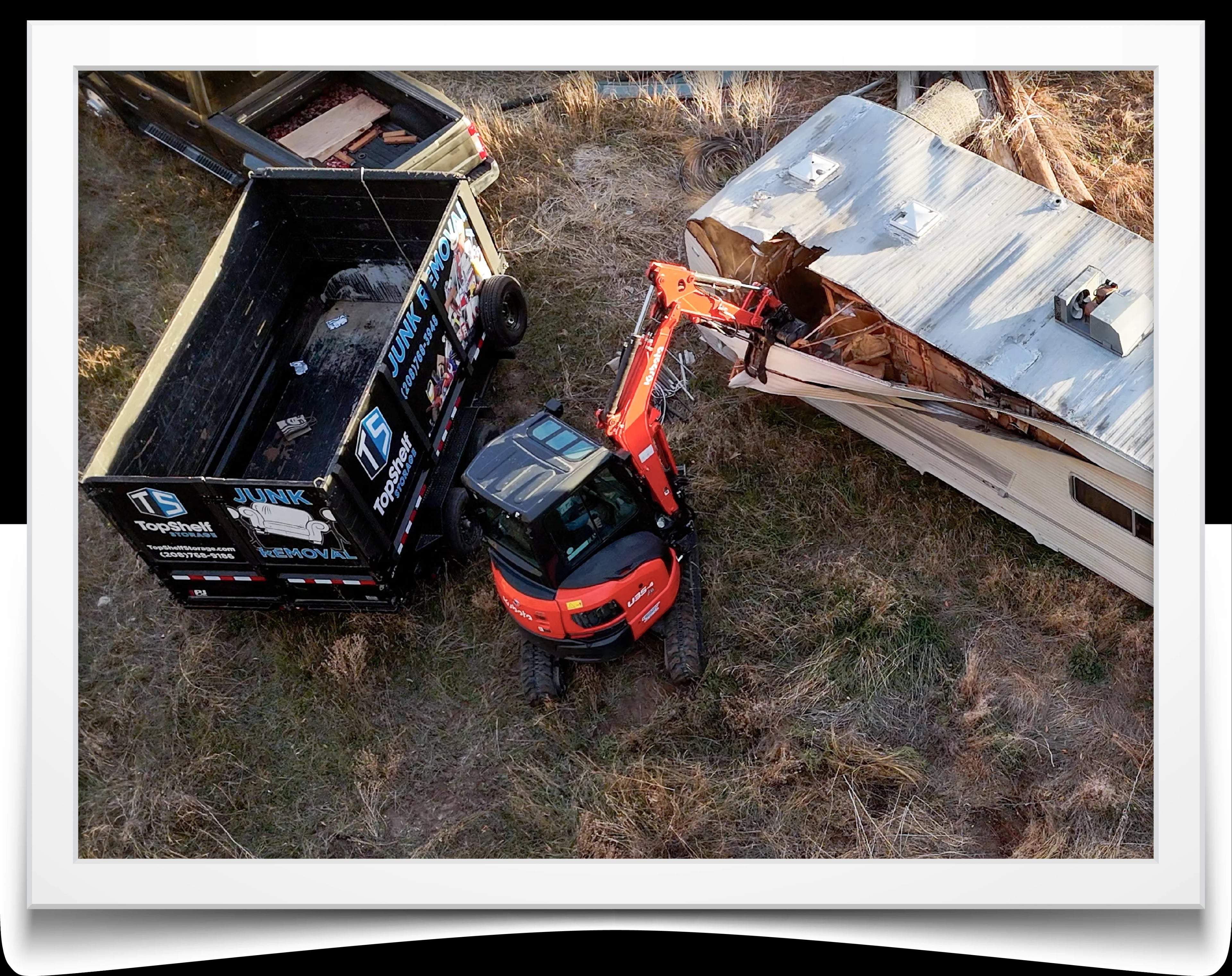 Demolition crew removing an old shed structure in Eagle Idaho - professional demo services